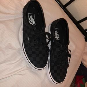 Black and grey checker vans.
